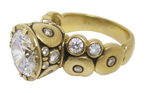 #R-129MD
“Orchard” ring, 18KY, .48ctw side diamonds (F-G/VVS), center stone needs to be 8.3-9 mm $6,475.00 (mounting only, available by special order)
