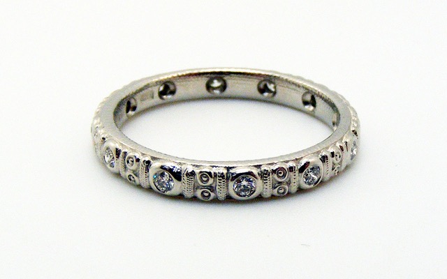 R73P
“Circle” platinum and diamond band, 2.5mm wide, 12-13 diamonds totaling approximately 0.16 ct. Immediately available in size 5 ¾.
$3,290.00
