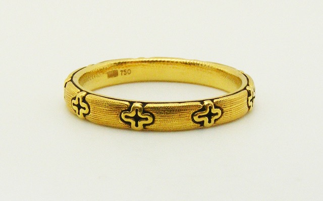 R93
“Little Crosses” 18K band, 2.7mm wide. Immediately available in size 6 ½.
$1,275.00
