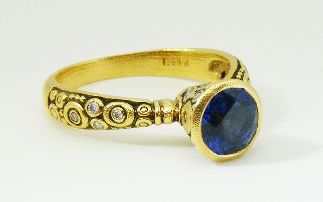 R128YY7.3
“Martini” ring in 18K yellow gold with a 1.54 ct blue sapphire and 17 diamonds totaling 0.20 ct. Available for immediate delivery in finger size 7 ¼ 
$4,750.00
