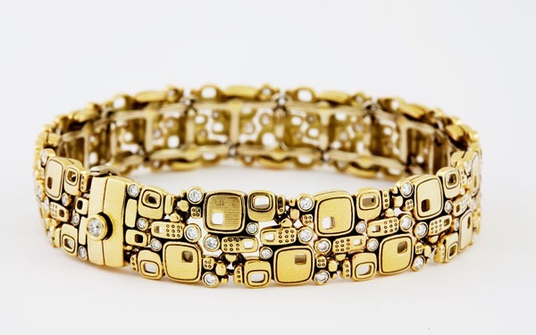 #B-31
“Little Windows” bracelet, 18KY, 77 Diamonds = 1.71 ctw (F-G/VVS) $21,225.00