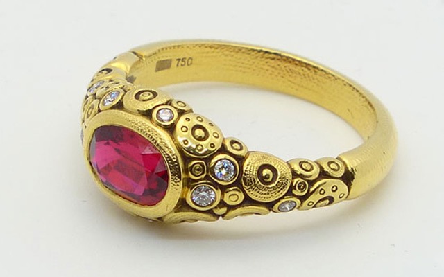 R-79M
18K yellow gold ring with a 1.0 ct Red Spinel center gemstone and 9 diamonds totaling 0.18 ct (F-G/VVS). 
Available for immediate delivery in finger size 6 ½. 
$6,125
