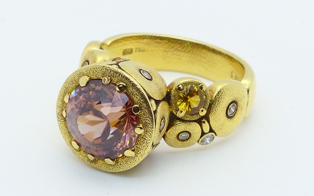 R-115MS
“Orchard” pink zircon ring, 18K yellow gold, 5.87 ct pink zircon, 4 side sapphires totaling 0.50 ct, 12 side diamonds totaling 0.12 ct. Available for immediate delivery in finger size 7 
$7,825
