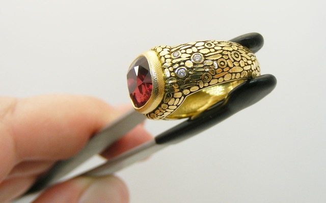 R-171M
“Mosaic” ruby ring, 18K yellow gold, 3.38 ct Ruby (H), 16 diamonds of .10 ctw total. 
Available for immediate delivery in finger size 7.
$28,920 
