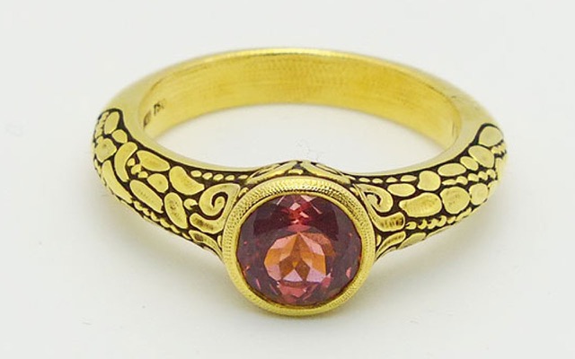R-42M
18K yellow gold tourmaline ring, 1.59 ct dark pink tourmaline center stone. 
Available for immediate delivery in finger size 6 ½ 
$3,410
