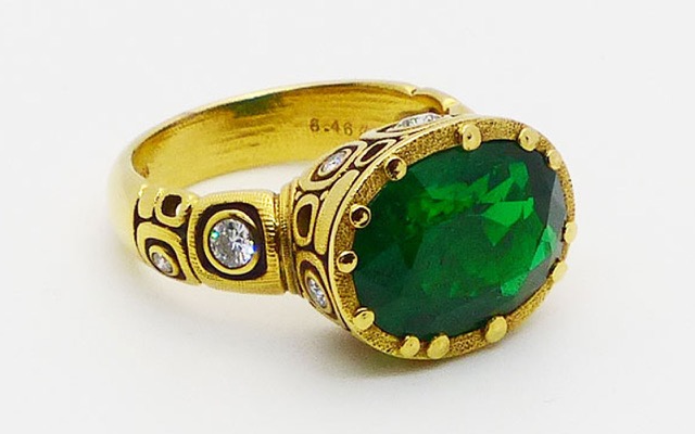 R-108AD (Sold)
“Little Windows” Zambian emerald ring, 18K yellow gold, 6.46 ct Zambian Emerald, 18 diamonds totaling 0.48 ct. 


