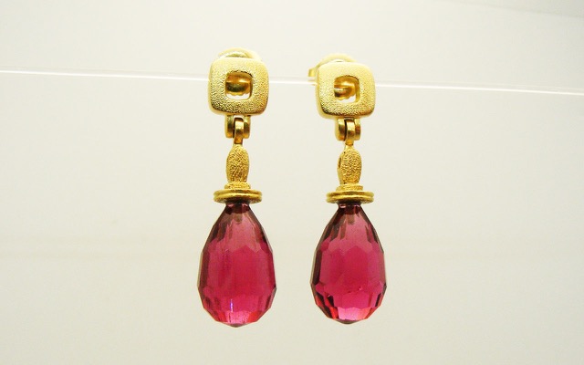 E238M
Rubellite earrings, 18K Yellow gold. Faceted Rubellite briolette drops are 12.75 ctw. 
$7635
