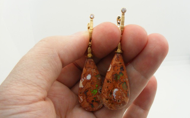 E132RMD
“Sticks & Stones” earrings in 18K rose gold with boulder opal drops and four diamonds totaling 0.11 ct. The opals have a total weight of 57.87 cts. These striking Mexican boulder opal drops feature pools and rivulets of color in a polished caramel-brown rhyolite matrix. They are world travelers: Mined in Magdalena, Mexico, cut in Idar-Oberstein in Germany, and set at Alex Šepkus’ workshop in New York City.
Immediate delivery 
$4,165
