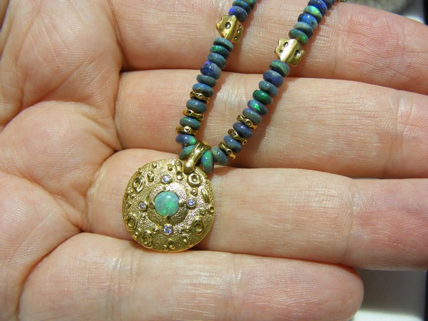 M-70MD	(Sold)
Opal and diamond 