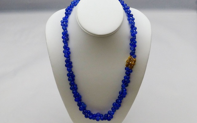 Double-strand Tanzanite bead necklace with 18K yellow gold and diamond clasp. Periwinkle that subtly shifts from royal blue to violet when you look at it from different angles is the hallmark of this amazing African gemstone. Tanzanites total 417 carats and the “Little Windows” clasp (M-71C) contains seven diamonds totaling 0.12 ct.
immediate delivery
 $13,375.00
