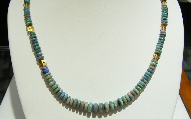 (Sold) Graduated opal strand with Alex Sepkus gold beads.