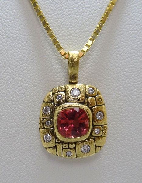 #M-75
“Mosaic” pendant in 18K yellow gold with a 2.04 cushion-cut coral-pink natural Spinel and 10  diamonds of 0.23 ct total (F-G/VVS). 
$7,400 
(Chain not included in price. This item is available in-store.)
