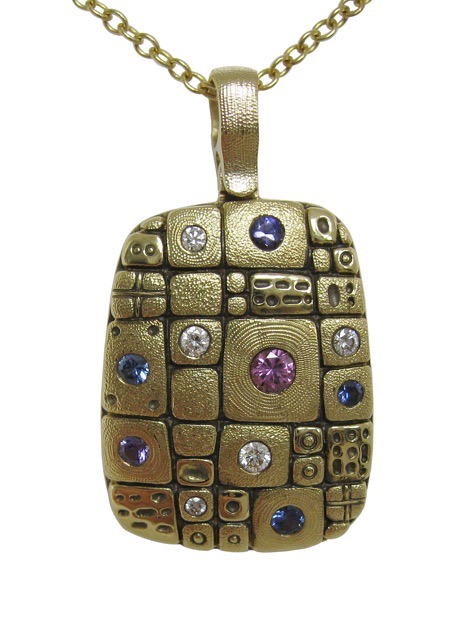 #M-74S
“Old Pathway” pendant in 18K yellow gold with 6 sapphires of 0.32 ct total and 5 diamonds of 0.09 ct total. 
$2,605
(This item is no longer available in-store, but may be special ordered.)
