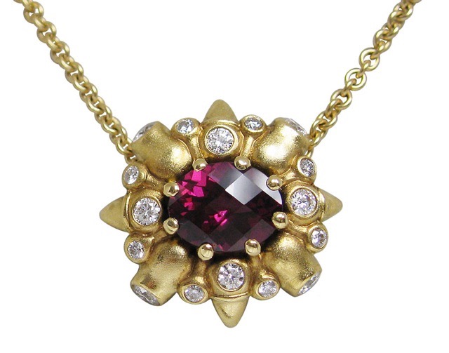 #M-4719
“Wind Rose” pendant, 18KY, 2.31 ct Garnet, .56 ctw Diamonds (F-G/VVS) (This item has sold but can be special ordered with a different center stone).