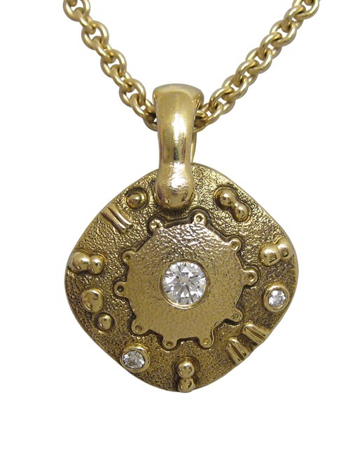 #M-56D15
“Submarine” pendant, 18KY, .07 ctw Diamonds, (includes a 18”, 18KY chain), $1685.00