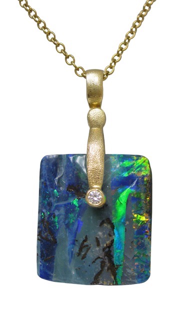#M-57D SOLD
“Sticks & Stones”, 18KY, 15.48 ct Australian Boulder Opal, .03 ctw Diamond $1475 (SOLD)
(Price does not include a chain).