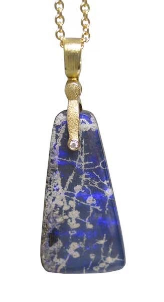 #M-48MD
“Sticks & Stones” pendant, 18KY, 17.15 ct Australian Boulder opal, .008 ct Diamond, $1,200.00
(Price does not include a chain).