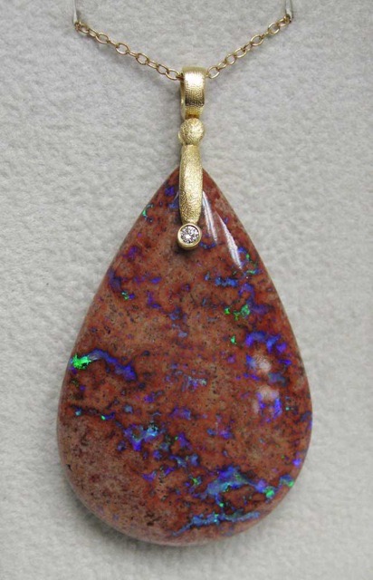 #M57D
“Sticks & Stones” pendant, 18KY, 71.28 ct. Mexican Boulder Opal, Diamond = .03 ct (F-G/VVS), $3,195.00