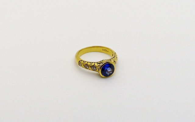 #R-80m
“Criss Cross” ring, 18ky, 1.73ct Blue Sapphire, .15ctw diamonds (F-G/VVS), size 6.5, $7,875.00