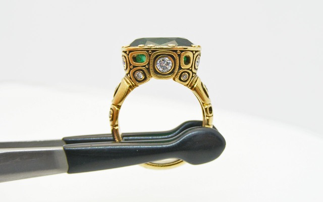 R-108AD
“Little Windows” Zambian emerald ring, 18K yellow gold, 6.46 ct Zambian Emerald, 18 diamonds totaling 0.48 ct. Available for immediate delivery in finger size 6 ¼ 
$32,317
