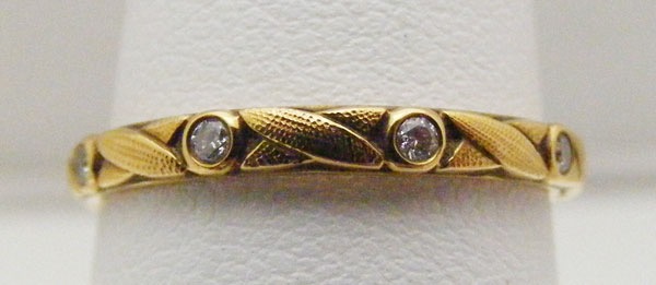 R121R
“Vine”, 18K rose gold, .14 ctw diamonds, 2.4mm wide, in store in size 6 ½ 
$1,860
